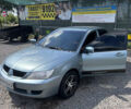 Сірий Міцубісі Lancer, об'ємом двигуна 1.58 л та пробігом 180 тис. км за 4400 $, фото 1 на Automoto.ua