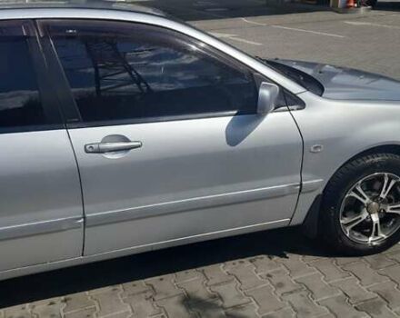 Серый Мицубиси Лансер, объемом двигателя 1.6 л и пробегом 420 тыс. км за 4900 $, фото 4 на Automoto.ua