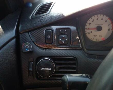 Серый Мицубиси Лансер, объемом двигателя 1.6 л и пробегом 210 тыс. км за 3500 $, фото 9 на Automoto.ua