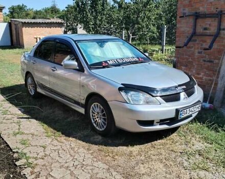 Сірий Міцубісі Lancer, об'ємом двигуна 1.6 л та пробігом 290 тис. км за 4600 $, фото 6 на Automoto.ua