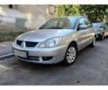 Сірий Міцубісі Lancer, об'ємом двигуна 1.58 л та пробігом 170 тис. км за 4600 $, фото 1 на Automoto.ua