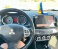 Серый Мицубиси Лансер, объемом двигателя 2 л и пробегом 202 тыс. км за 7300 $, фото 12 на Automoto.ua