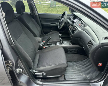 Сірий Міцубісі Lancer, об'ємом двигуна 1.6 л та пробігом 177 тис. км за 2800 $, фото 31 на Automoto.ua