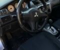 Сірий Міцубісі Lancer, об'ємом двигуна 1.6 л та пробігом 174 тис. км за 4800 $, фото 3 на Automoto.ua