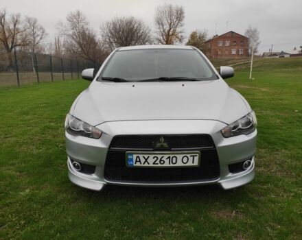 Серый Мицубиси Лансер, объемом двигателя 2 л и пробегом 124 тыс. км за 7499 $, фото 1 на Automoto.ua