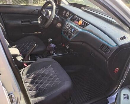 Сірий Міцубісі Lancer, об'ємом двигуна 1.6 л та пробігом 290 тис. км за 4600 $, фото 13 на Automoto.ua