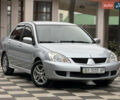 Сірий Міцубісі Lancer, об'ємом двигуна 1.6 л та пробігом 281 тис. км за 3999 $, фото 1 на Automoto.ua
