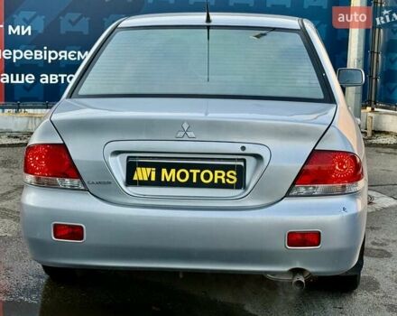 Сірий Міцубісі Lancer, об'ємом двигуна 1.6 л та пробігом 395 тис. км за 4900 $, фото 10 на Automoto.ua
