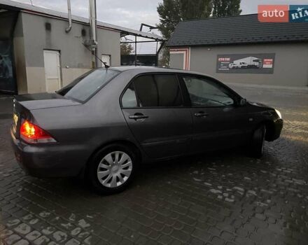 Сірий Міцубісі Lancer, об'ємом двигуна 1.6 л та пробігом 330 тис. км за 3500 $, фото 30 на Automoto.ua
