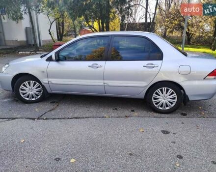 Сірий Міцубісі Lancer, об'ємом двигуна 1.58 л та пробігом 122 тис. км за 6300 $, фото 26 на Automoto.ua