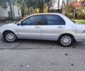 Сірий Міцубісі Lancer, об'ємом двигуна 1.58 л та пробігом 122 тис. км за 6300 $, фото 26 на Automoto.ua