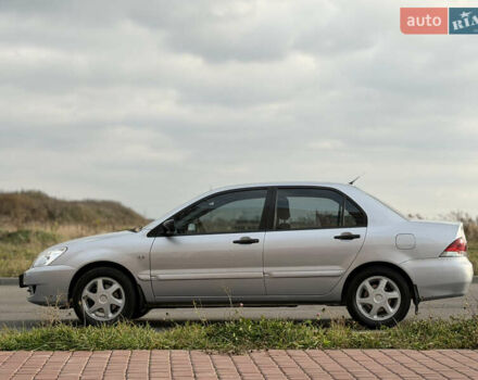 Серый Мицубиси Лансер, объемом двигателя 1.3 л и пробегом 160 тыс. км за 5555 $, фото 12 на Automoto.ua