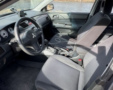 Серый Мицубиси Лансер, объемом двигателя 1.6 л и пробегом 129 тыс. км за 5000 $, фото 2 на Automoto.ua