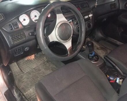 Серый Мицубиси Лансер, объемом двигателя 1.6 л и пробегом 308 тыс. км за 3800 $, фото 5 на Automoto.ua