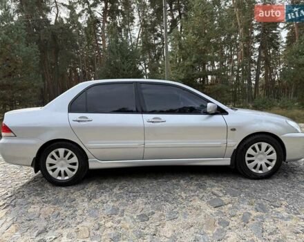 Серый Мицубиси Лансер, объемом двигателя 1.6 л и пробегом 200 тыс. км за 4400 $, фото 6 на Automoto.ua