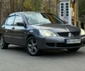 Серый Мицубиси Лансер, объемом двигателя 1.6 л и пробегом 220 тыс. км за 3199 $, фото 6 на Automoto.ua