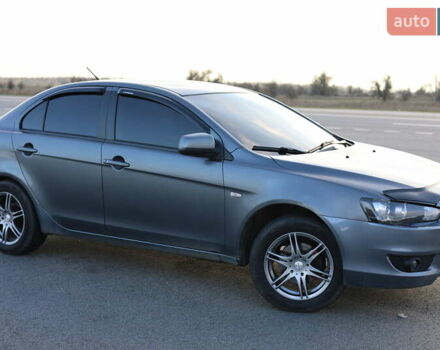 Серый Мицубиси Лансер, объемом двигателя 1.5 л и пробегом 330 тыс. км за 5250 $, фото 6 на Automoto.ua