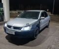 Сірий Міцубісі Lancer, об'ємом двигуна 1.6 л та пробігом 260 тис. км за 2600 $, фото 1 на Automoto.ua