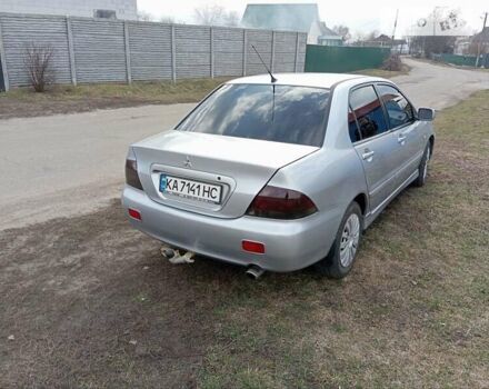 Сірий Міцубісі Lancer, об'ємом двигуна 1.6 л та пробігом 197 тис. км за 5100 $, фото 5 на Automoto.ua