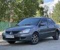 Сірий Міцубісі Lancer, об'ємом двигуна 0.16 л та пробігом 250 тис. км за 4350 $, фото 1 на Automoto.ua