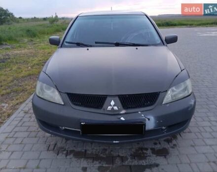 Мицубиси Лансер 2007 в Ивано-Франковске на Automoto.ua Серый Мицубиси Лансер, объемом двигателя 1.58 л и пробегом 238 тыс. км за 2950 $, фото 10 на Automoto.ua