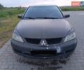 Мицубиси Лансер 2007 в Ивано-Франковске на Automoto.ua Серый Мицубиси Лансер, объемом двигателя 1.58 л и пробегом 238 тыс. км за 2950 $, фото 10 на Automoto.ua