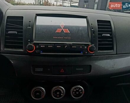 Сірий Міцубісі Lancer, об'ємом двигуна 2 л та пробігом 268 тис. км за 5555 $, фото 6 на Automoto.ua