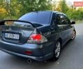 Сірий Міцубісі Lancer, об'ємом двигуна 2 л та пробігом 193 тис. км за 5000 $, фото 1 на Automoto.ua