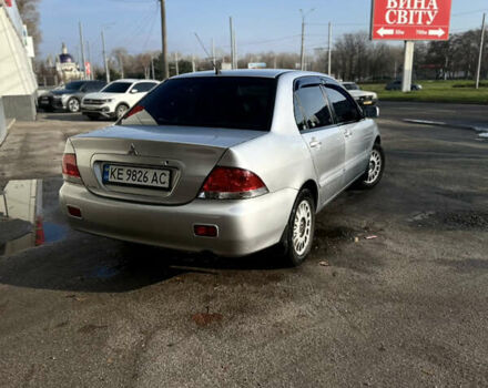 Сірий Міцубісі Lancer, об'ємом двигуна 1.6 л та пробігом 249 тис. км за 5100 $, фото 4 на Automoto.ua