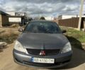Серый Мицубиси Лансер, объемом двигателя 1.6 л и пробегом 200 тыс. км за 2300 $, фото 1 на Automoto.ua