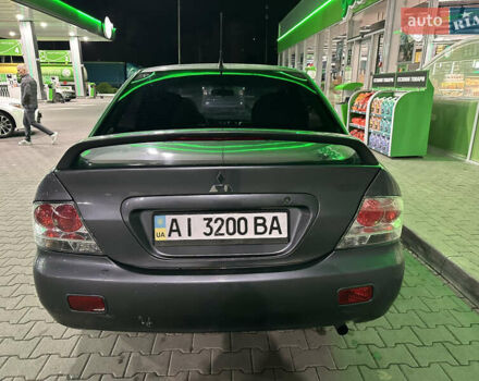 Серый Мицубиси Лансер, объемом двигателя 1.6 л и пробегом 112 тыс. км за 2800 $, фото 5 на Automoto.ua