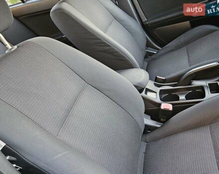 Серый Мицубиси Лансер, объемом двигателя 2 л и пробегом 282 тыс. км за 5450 $, фото 64 на Automoto.ua