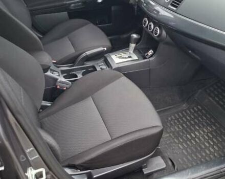 Серый Мицубиси Лансер, объемом двигателя 2 л и пробегом 189 тыс. км за 6800 $, фото 8 на Automoto.ua