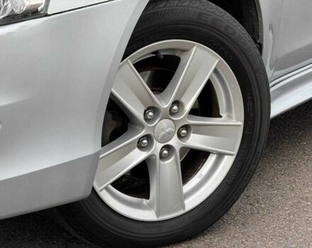 Серый Мицубиси Лансер, объемом двигателя 2 л и пробегом 207 тыс. км за 5800 $, фото 6 на Automoto.ua