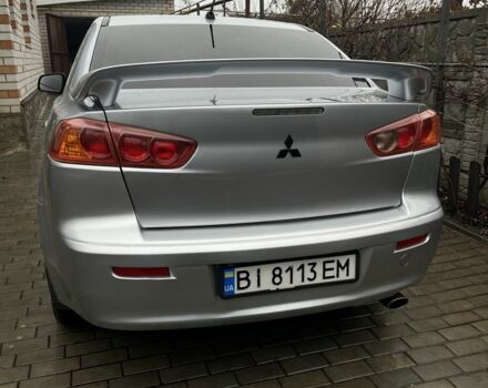 Серый Мицубиси Лансер, объемом двигателя 2 л и пробегом 227 тыс. км за 6600 $, фото 6 на Automoto.ua