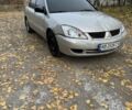 Сірий Міцубісі Lancer, об'ємом двигуна 1.6 л та пробігом 180 тис. км за 2500 $, фото 1 на Automoto.ua