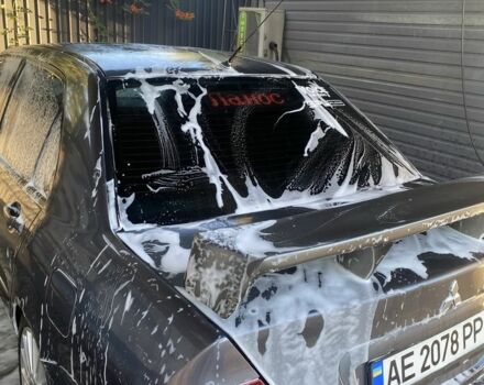 Серый Мицубиси Лансер, объемом двигателя 1.6 л и пробегом 250 тыс. км за 3999 $, фото 21 на Automoto.ua