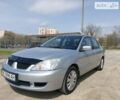 Сірий Міцубісі Lancer, об'ємом двигуна 1.6 л та пробігом 148 тис. км за 5000 $, фото 1 на Automoto.ua