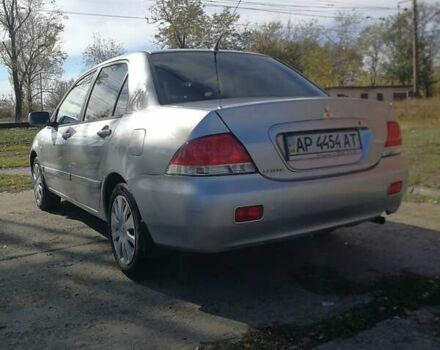 Сірий Міцубісі Lancer, об'ємом двигуна 1.6 л та пробігом 142 тис. км за 4700 $, фото 4 на Automoto.ua