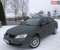 Серый Мицубиси Лансер, объемом двигателя 1.6 л и пробегом 320 тыс. км за 3999 $, фото 1 на Automoto.ua