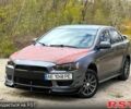 Серый Мицубиси Лансер, объемом двигателя 1.5 л и пробегом 223 тыс. км за 5600 $, фото 1 на Automoto.ua