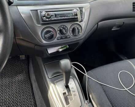 Серый Мицубиси Лансер, объемом двигателя 1.6 л и пробегом 129 тыс. км за 5000 $, фото 1 на Automoto.ua