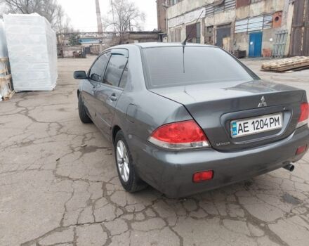 Серый Мицубиси Лансер, объемом двигателя 1.6 л и пробегом 220 тыс. км за 4200 $, фото 2 на Automoto.ua