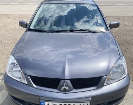 Сірий Міцубісі Lancer, об'ємом двигуна 1.59 л та пробігом 44 тис. км за 6200 $, фото 7 на Automoto.ua