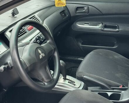 Серый Мицубиси Лансер, объемом двигателя 1.6 л и пробегом 298 тыс. км за 3600 $, фото 6 на Automoto.ua