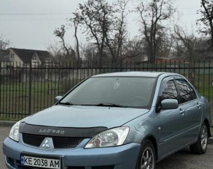 Серый Мицубиси Лансер, объемом двигателя 1.6 л и пробегом 238 тыс. км за 4300 $, фото 19 на Automoto.ua