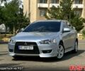 Серый Мицубиси Лансер, объемом двигателя 2 л и пробегом 180 тыс. км за 6000 $, фото 1 на Automoto.ua