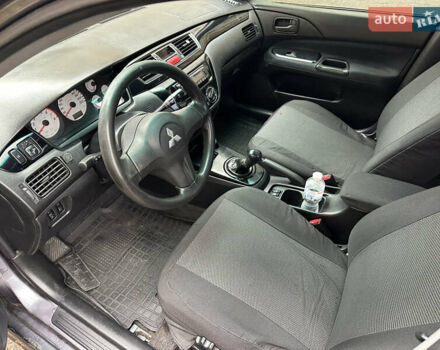 Серый Мицубиси Лансер, объемом двигателя 1.6 л и пробегом 115 тыс. км за 2800 $, фото 12 на Automoto.ua