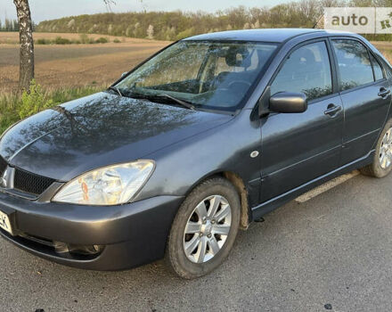 Сірий Міцубісі Lancer, об'ємом двигуна 1.6 л та пробігом 207 тис. км за 4800 $, фото 1 на Automoto.ua