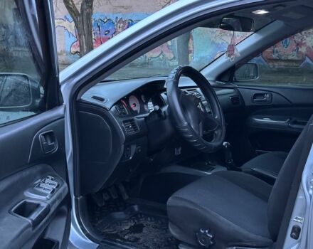 Сірий Міцубісі Lancer, об'ємом двигуна 1.6 л та пробігом 210 тис. км за 4750 $, фото 6 на Automoto.ua